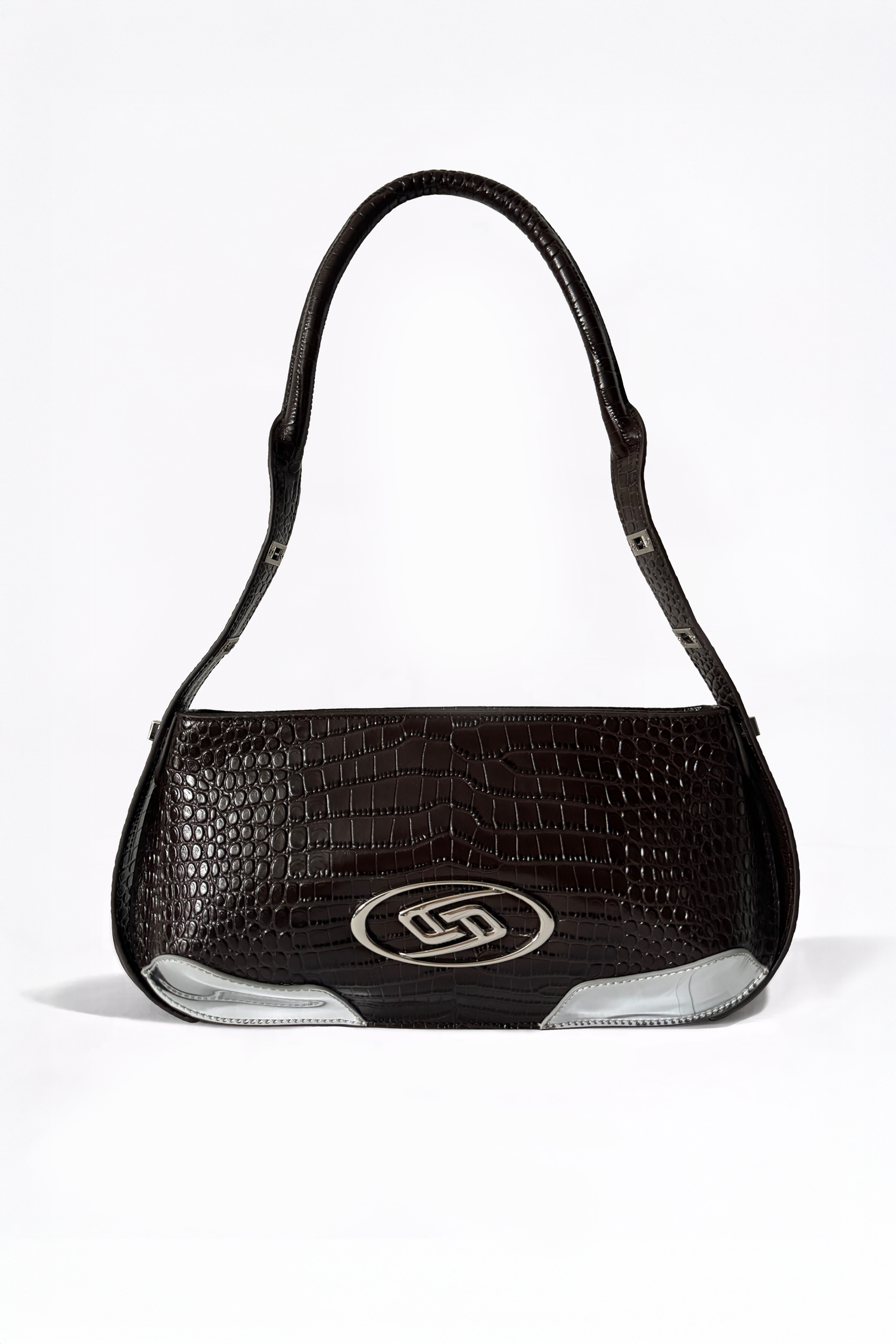 The Avenue Bag by AYZAHD in Sable Ember. A masterclass in structural discipline, combining a sharp, futuristic silhouette with the rich texture of croco-embossed calfskin. Designed in Dubai for the modern vanguard.