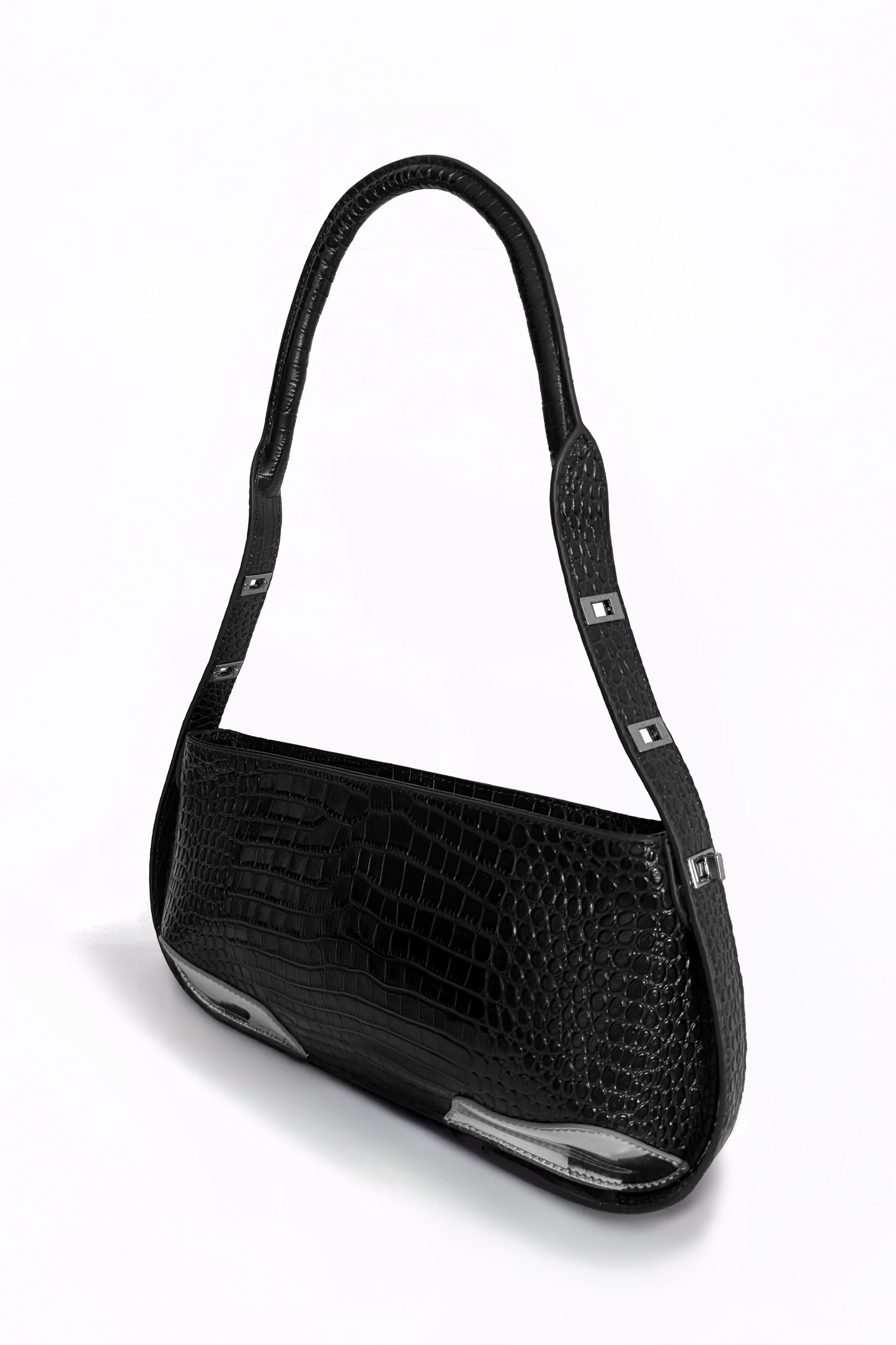 Defined by its rigid, linear elegance, The Avenue Bag by AYZAHD reimagines modern leatherwork. An architectural masterpiece in croco-embossed calfskin, proudly conceived and designed in Dubai.