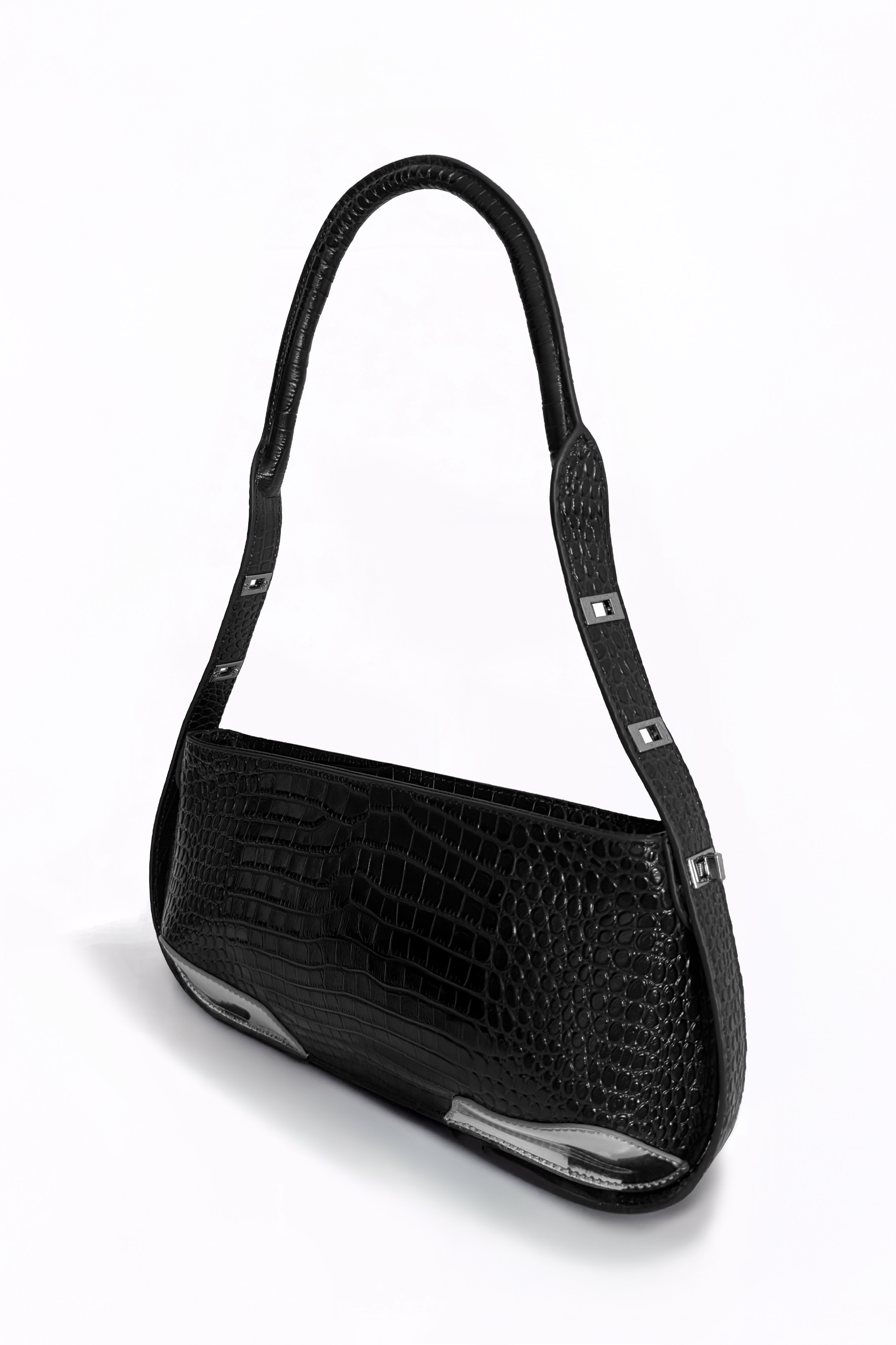 Defined by its rigid, linear elegance, The Avenue Bag by AYZAHD reimagines modern leatherwork. An architectural masterpiece in croco-embossed calfskin, proudly conceived and designed in Dubai.