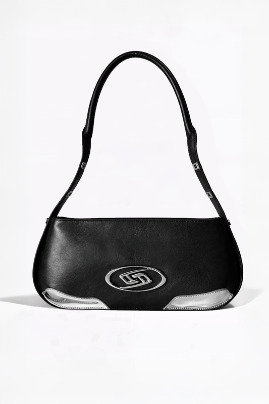 The Avenue Bag by AYZAHD in Midnight Eclipse. A masterclass in structural discipline, pairing a sharp, futuristic silhouette with the rich texture of pigment-rich grained calfskin. Designed in Dubai for the modern vanguard.