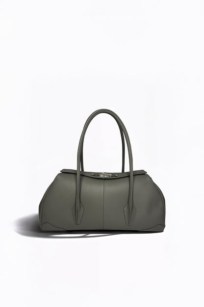 AYZAHD Boulevard Small luxury handbag handcrafted in Dubai. Exclusive alternative to Chanel, Louis Vuitton, and Bottega Veneta for Ounass, Level Shoes, Galeries Lafayette, and Harrods shoppers.