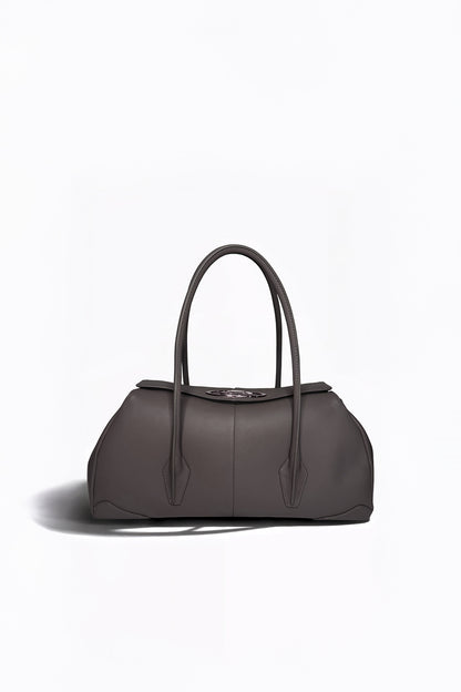 AYZAHD Boulevard Small luxury handbag handcrafted in Dubai. Exclusive alternative to Chanel, Louis Vuitton, and Bottega Veneta for Ounass, Level Shoes, Galeries Lafayette, and Harrods shoppers.