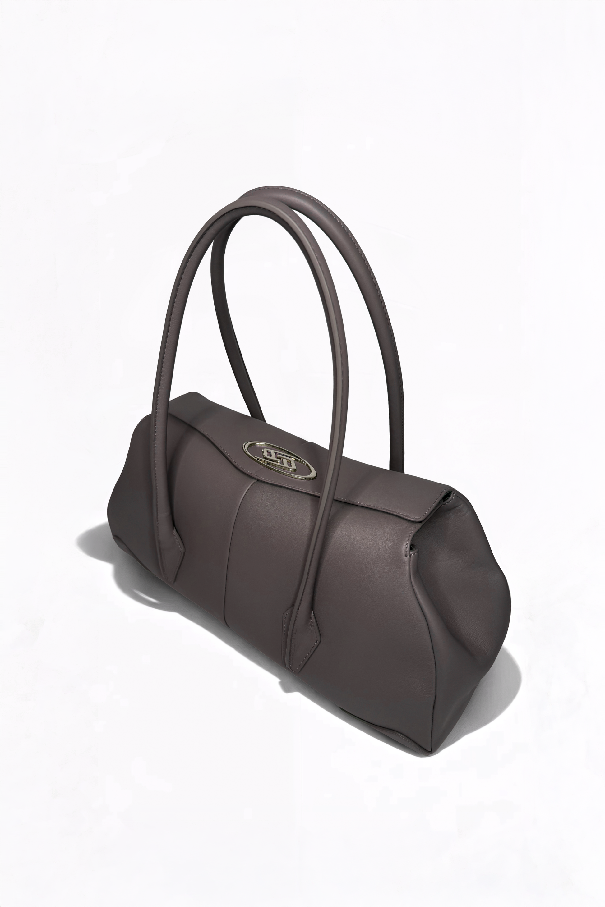 Side profile of AYZAHD Boulevard Small. High-end leather quality surpassing Jacquemus, Polène, and Manu Atelier. Contemporary luxury aesthetic for fans of Miu Miu, Loewe, and By Far.