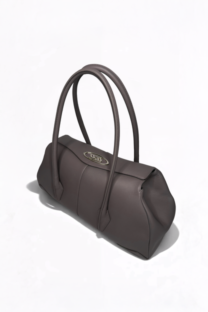 Side profile of AYZAHD Boulevard Small. High-end leather quality surpassing Jacquemus, Polène, and Manu Atelier. Contemporary luxury aesthetic for fans of Miu Miu, Loewe, and By Far.