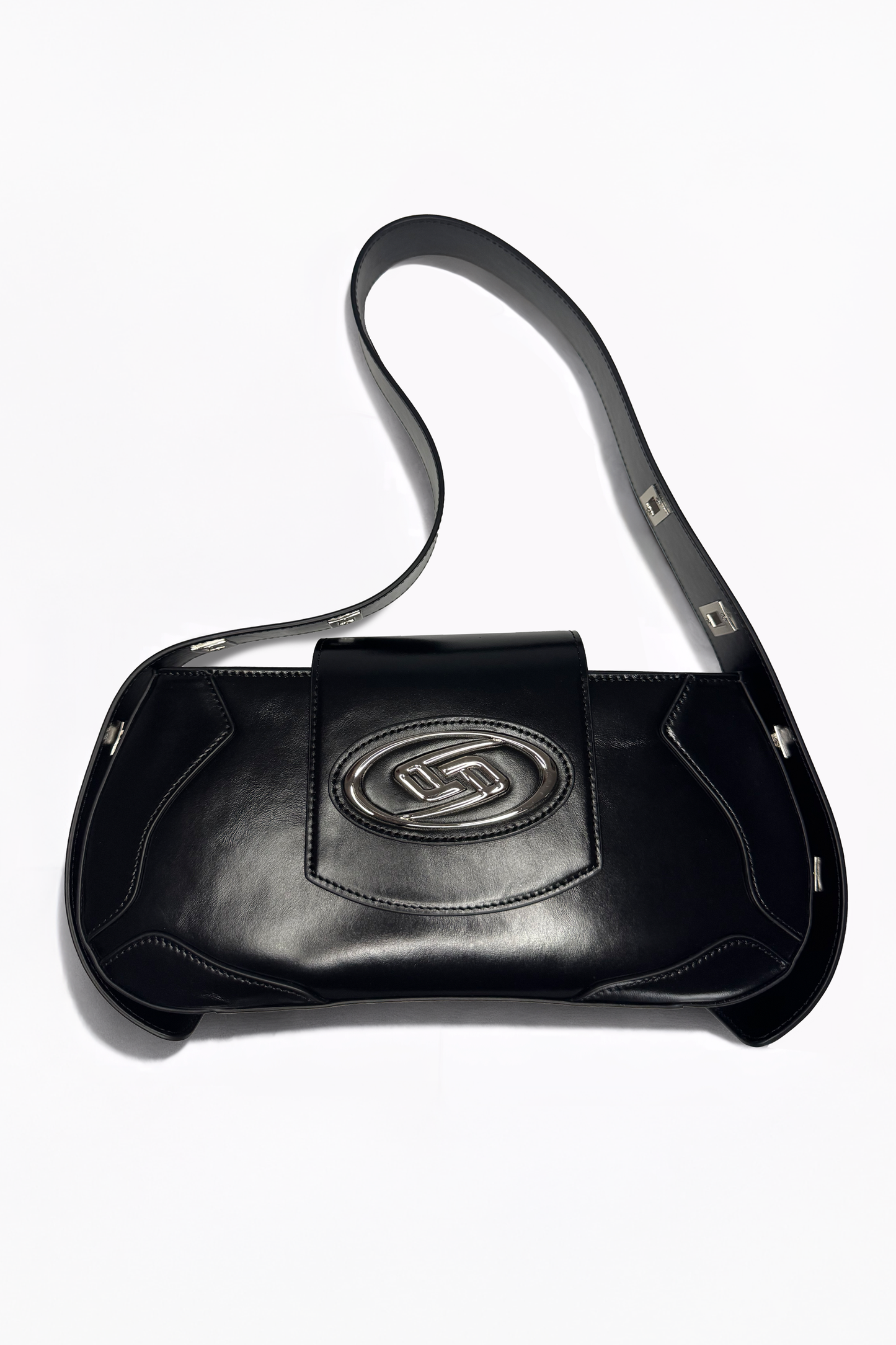 The Downtown Bag by AYZAHD in Obsidian Veil. Bringing raw luxury and sharp, geometric forms to the contemporary urban wardrobe. Crafted from premium grained oiled soft calfskin and designed in Dubai.